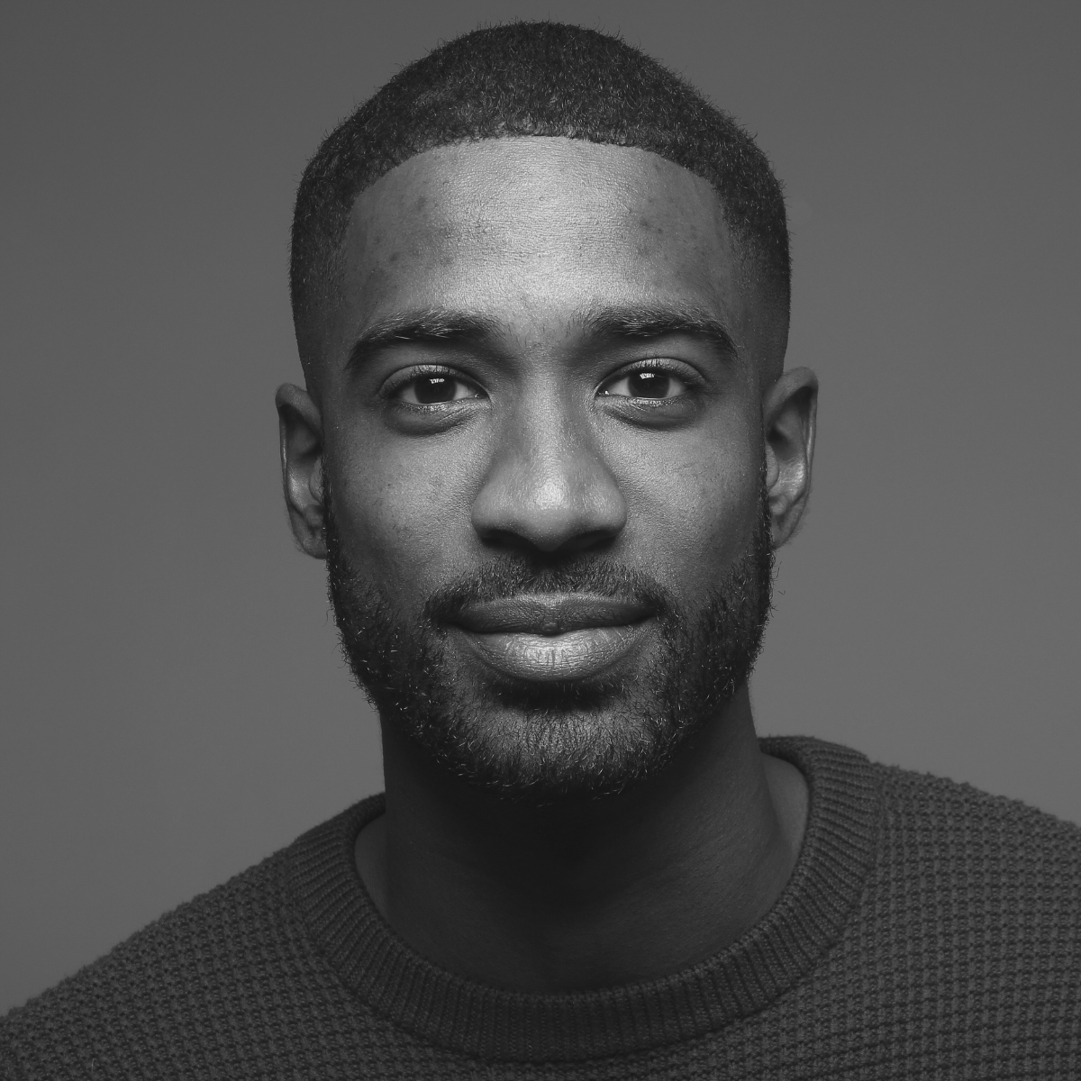 Professional male executive headshot in business attire representing HR leadership.