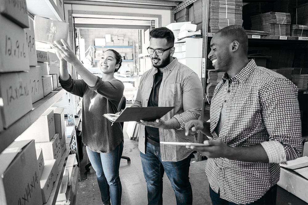 Team of executives in a strategy meeting discussing competitive advantage and market positioning